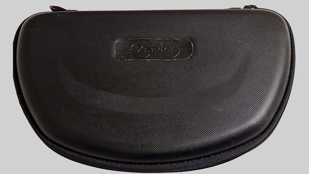 Black clamshell carrying case with zipper